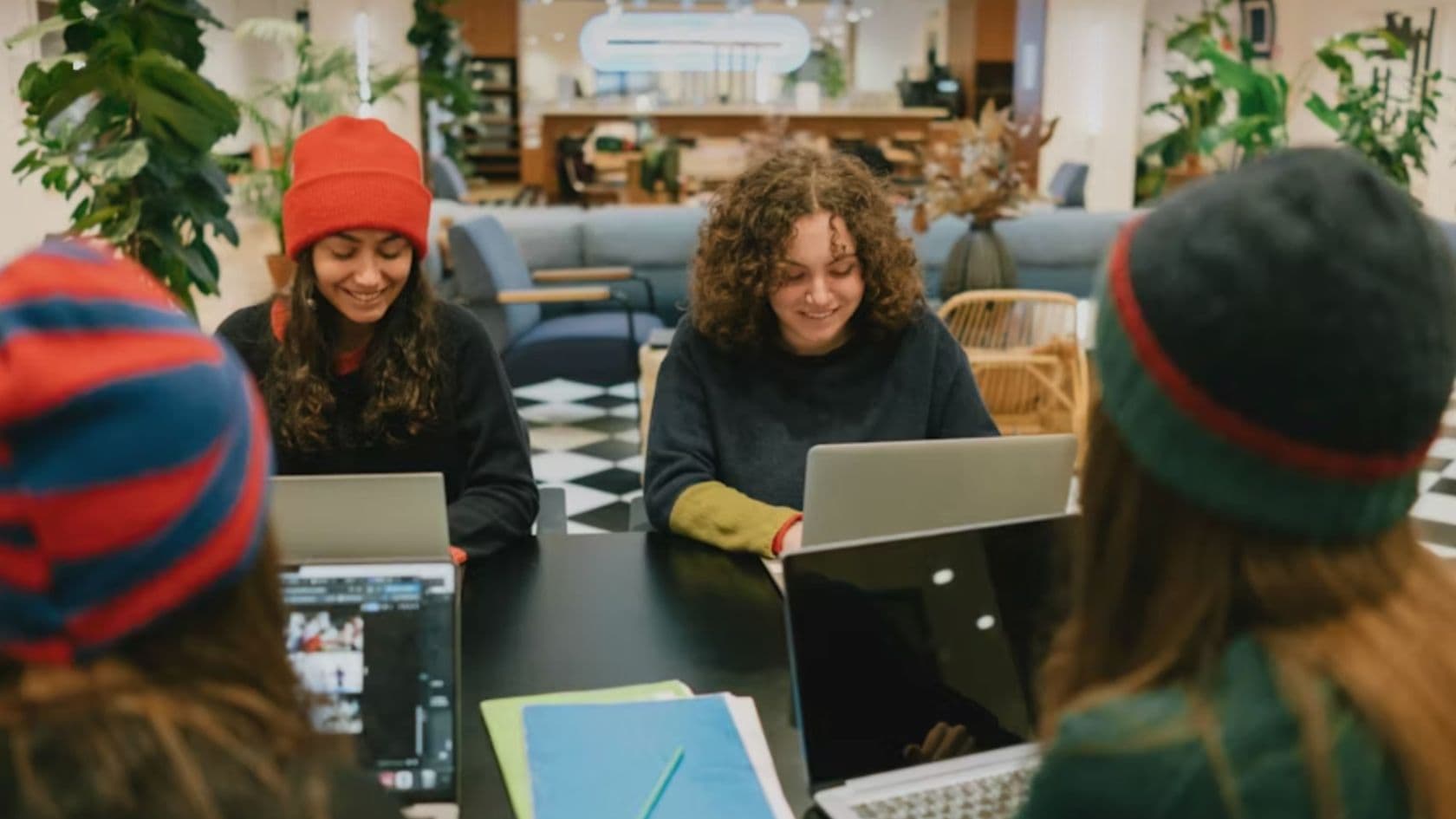 A small group of community members gathered in a circle during a Desert Rose Gives program session.